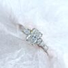 Radiant Cut Diamond Ring with Pear Side Stones